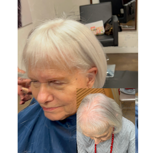 Woman wearing a hair topper