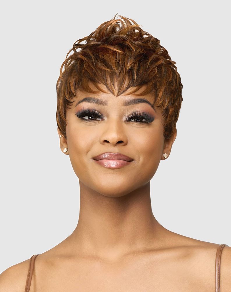 Vanessa Carin wig — choppy pixie-mohawk with tapered sides and warm brown STAIN color blend, made with heat-safe synthetic fibers.