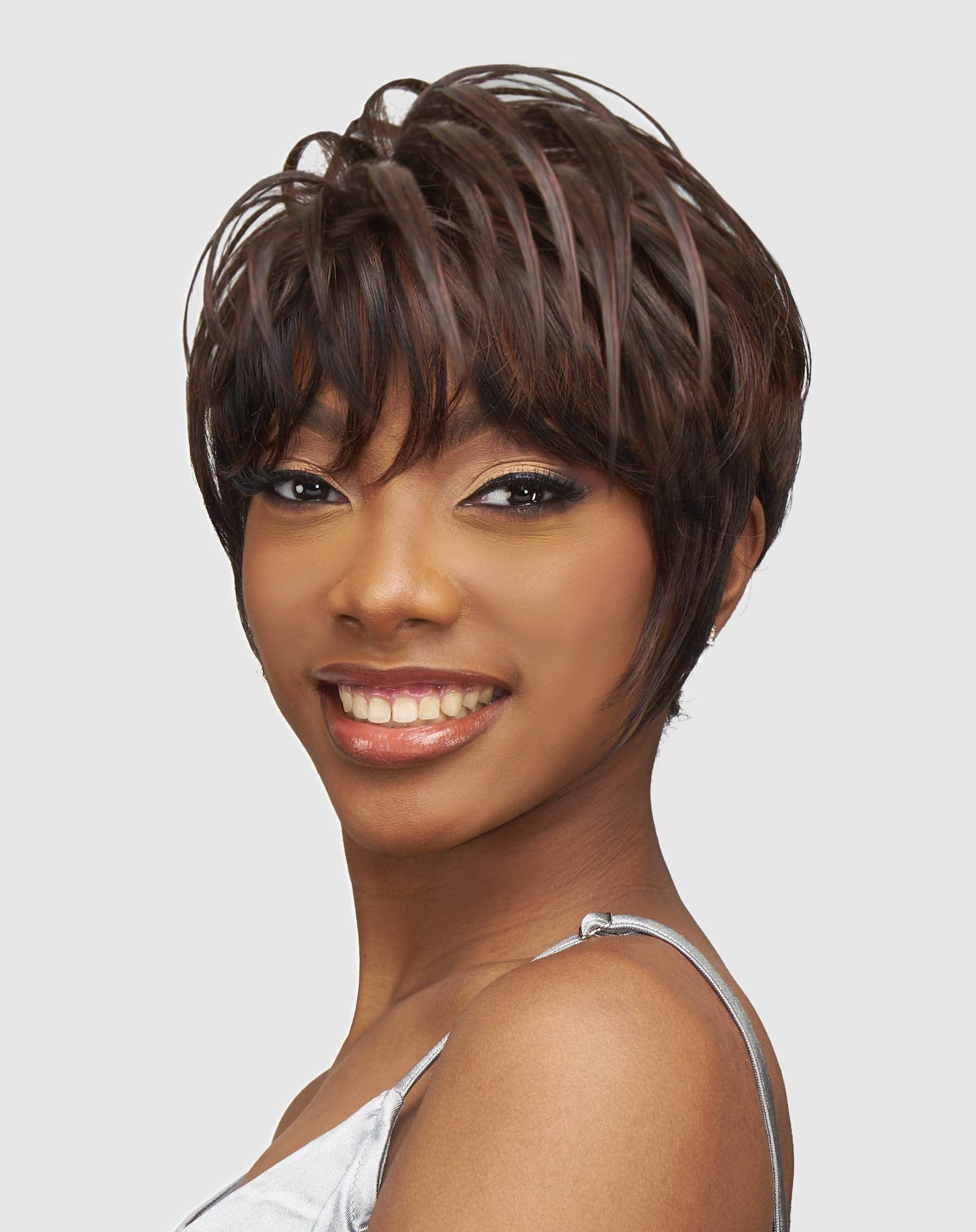 Vanessa Kaby wig — long pixie cut with feathered layers and side-swept bangs made with heat-safe synthetic fibers, displayed for a sleek, glamorous look.