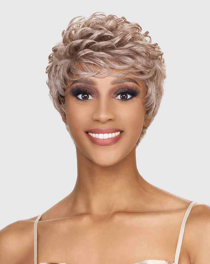 Vanessa TEE wig — short wave-cut pixie with soft top volume, tapered nape, and salt-and-pepper 280 color, made with heat-safe fibers.